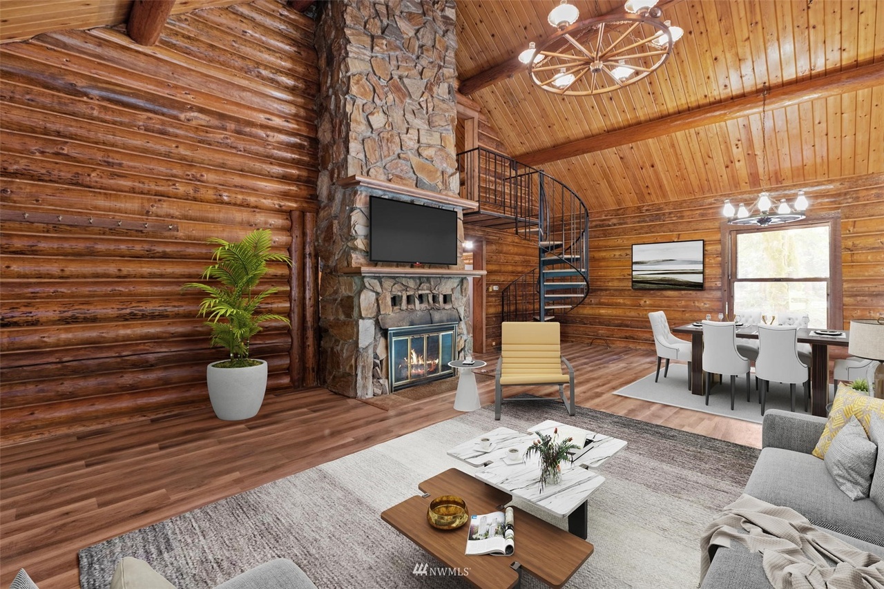 Cozy living space centered on a stacked-stone fireplace